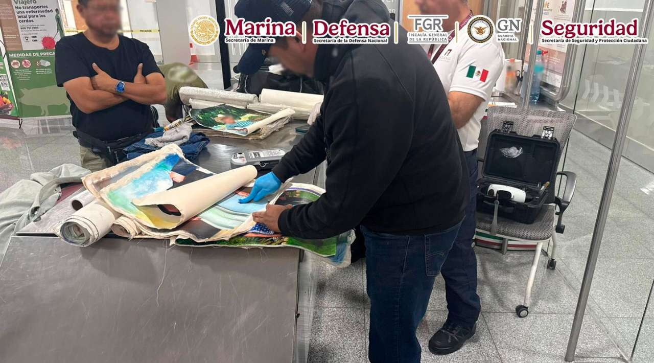 Detienen en el AICM a extranjero que transportaba cocaína oculta en pinturas